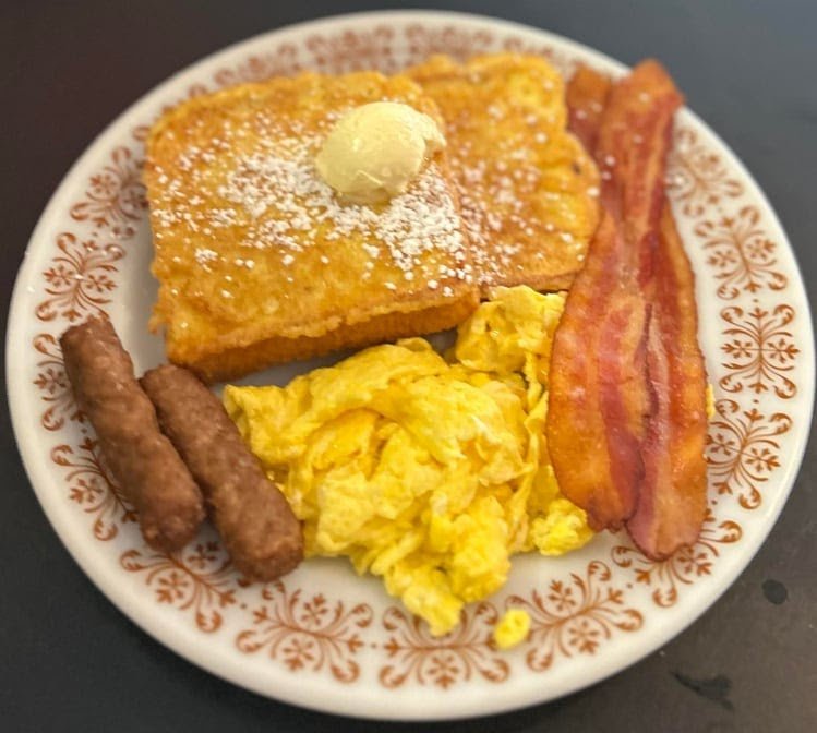 Menu page with breakfast, lunch, and dinner sections.